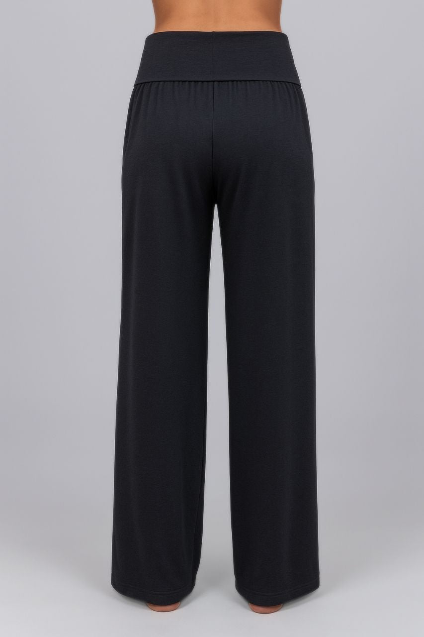 Black wide-leg pants on a gray background