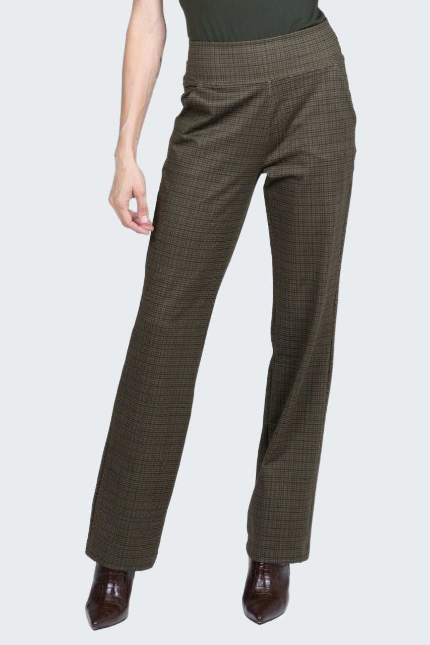 Brown plaid pants worn by a person on a white background