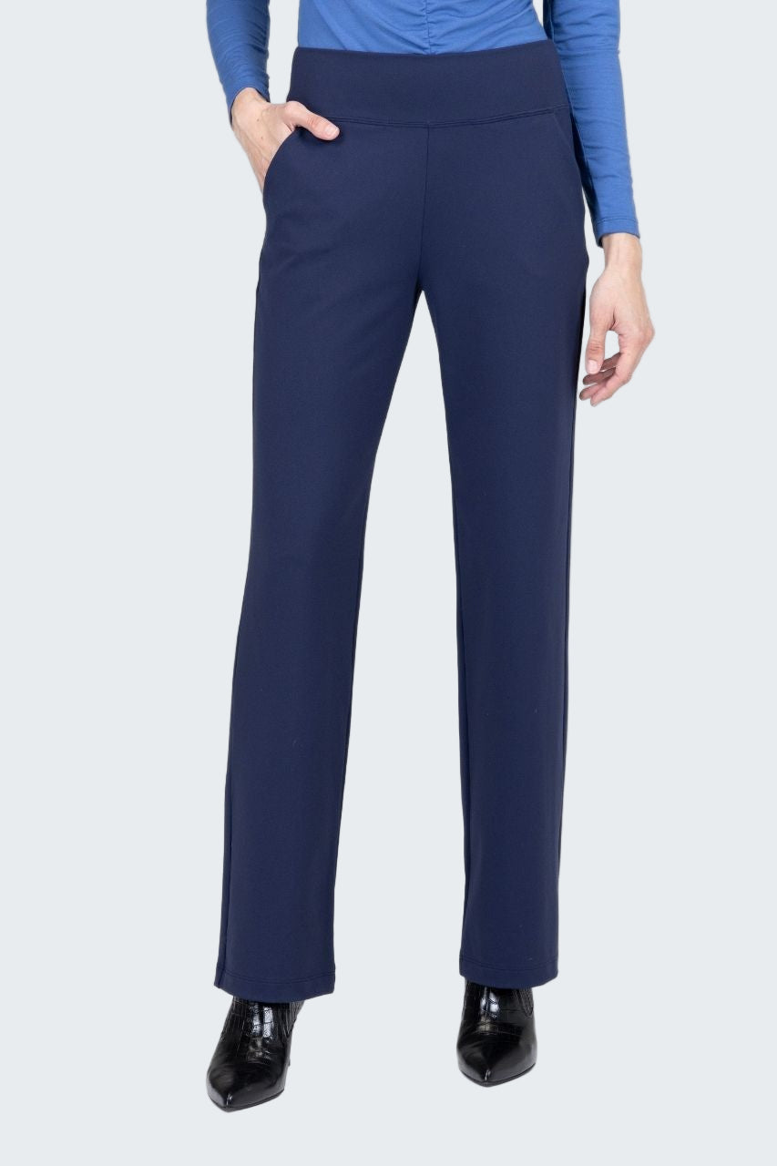 Navy blue pants worn by a person on a white background