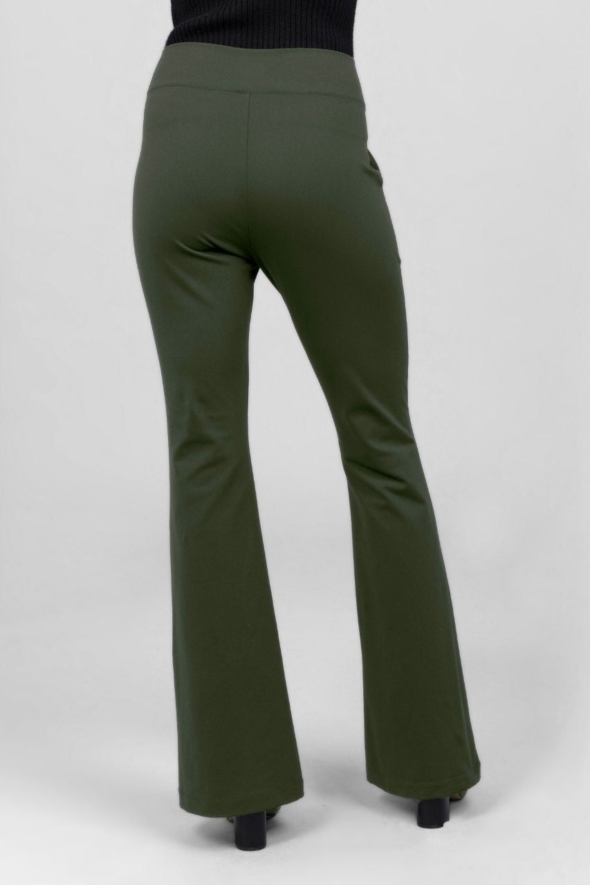 Green flared pants on a white background