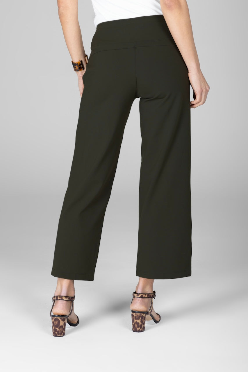 Black wide-leg pants worn by a person on a gray background