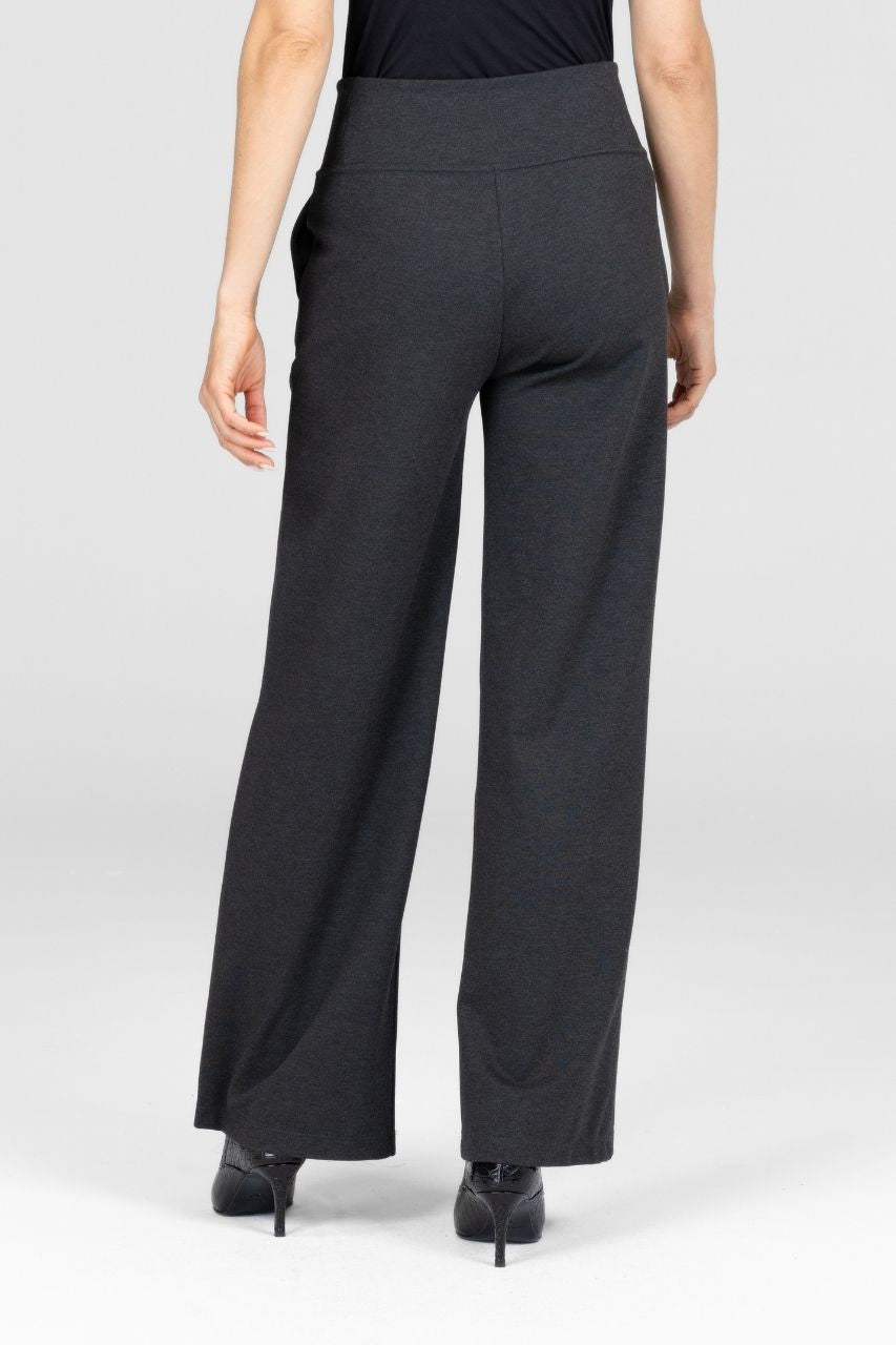 Dark gray wide-leg pants worn by a person on a white background