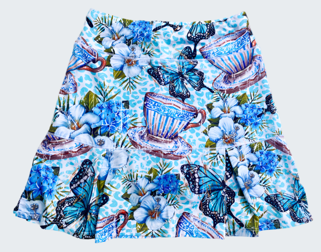 Skirt with floral and teacup pattern on a white background