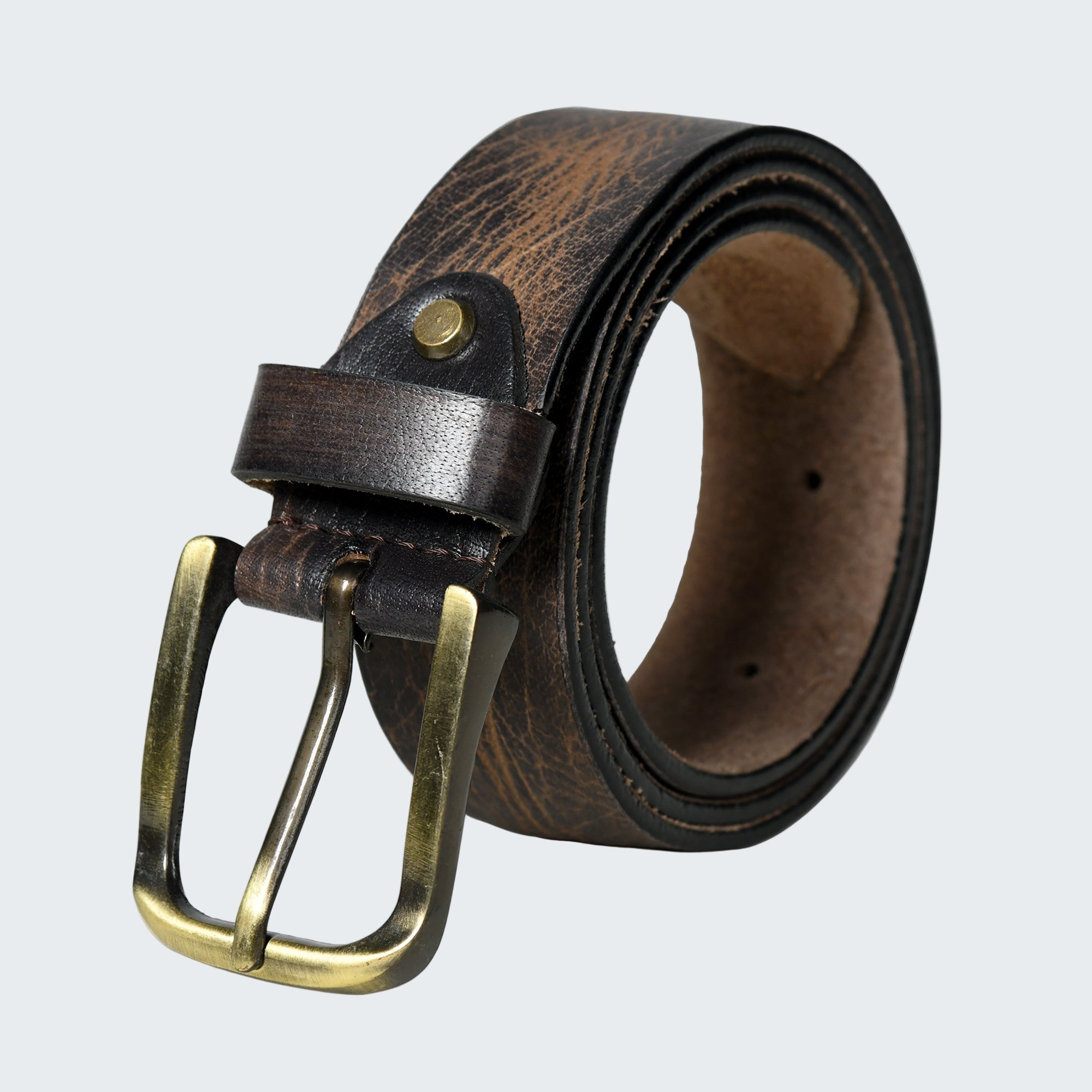 Brown leather belt with brass buckle on a white background