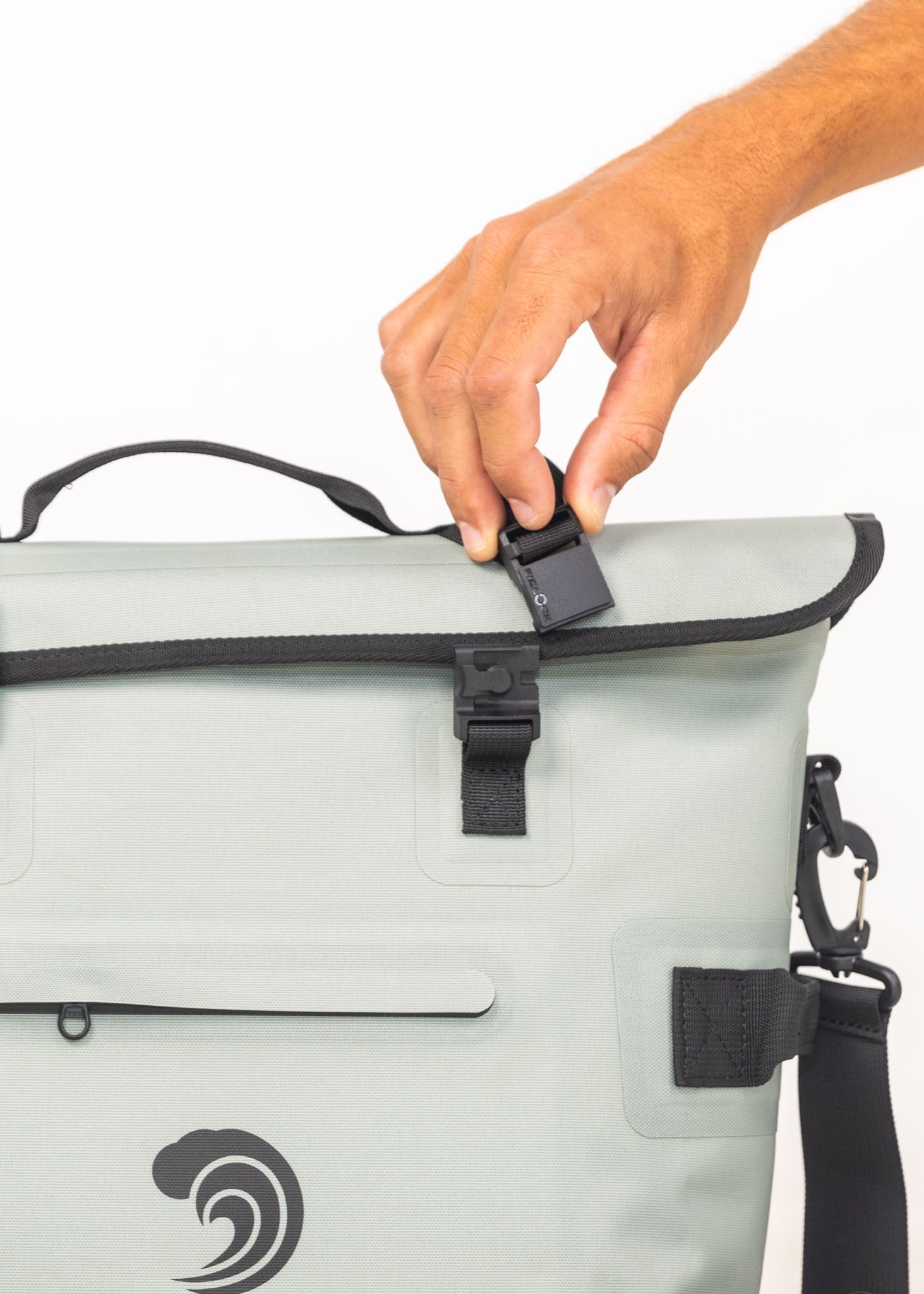 Light gray backpack with black straps and a visible brand logo on a white background