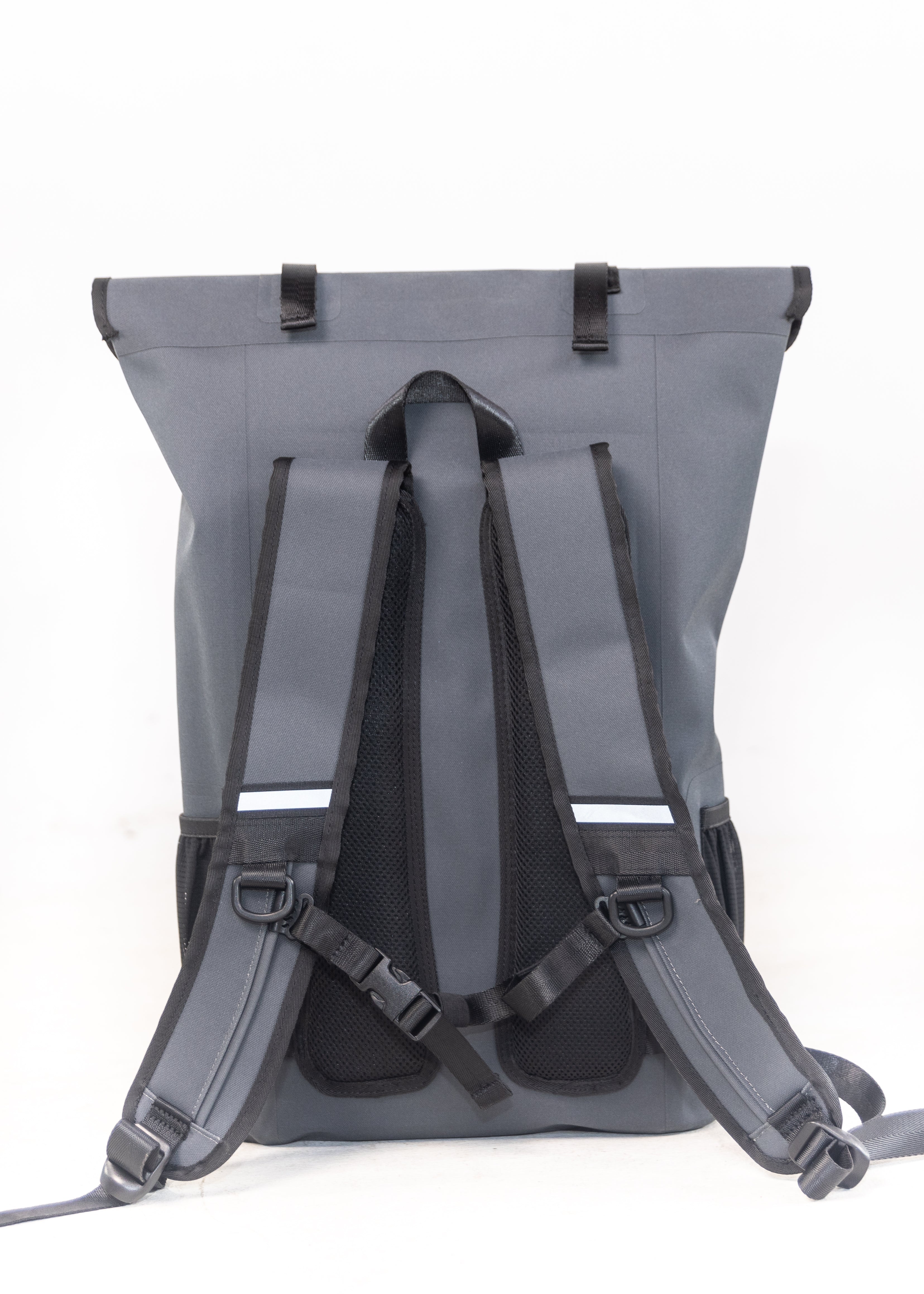 Gray backpack with black straps on a white background