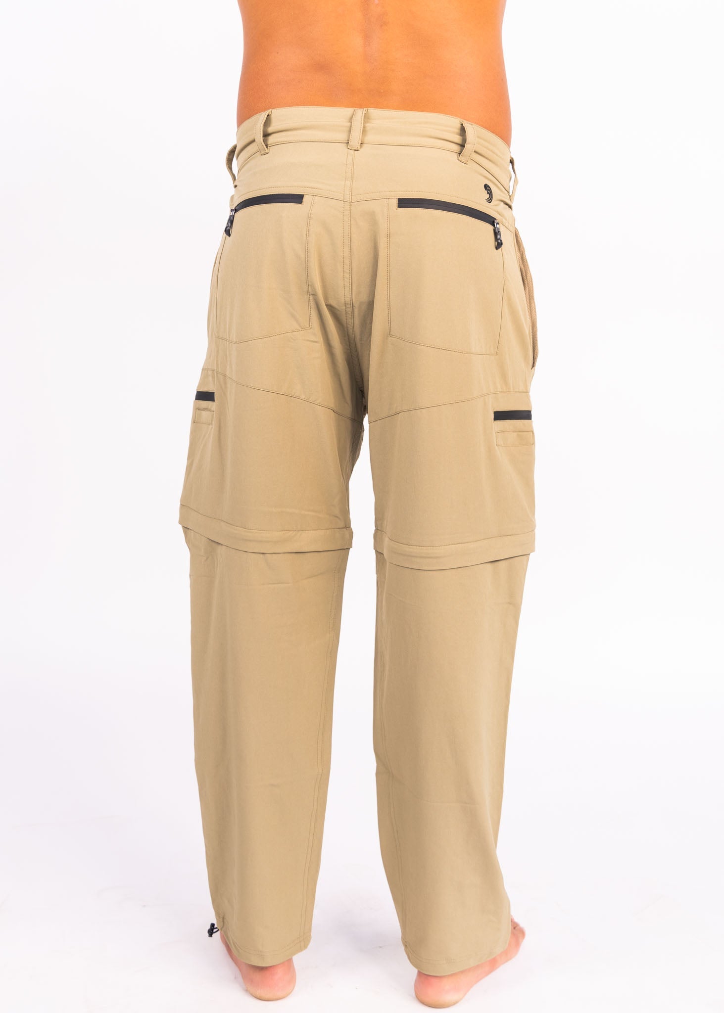 Beige pants with zippers on a white background