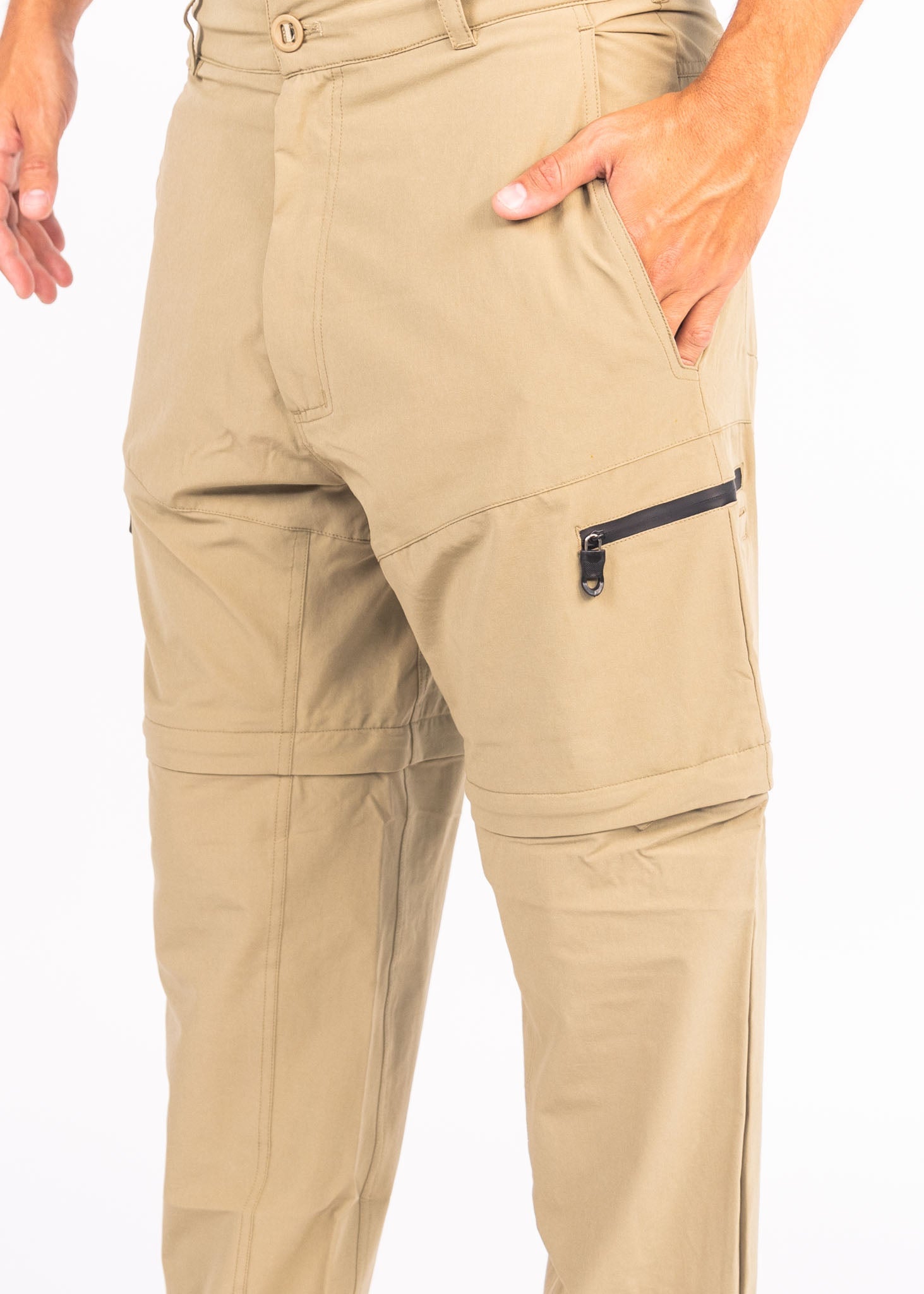 Beige pants with a zipper pocket on a white background