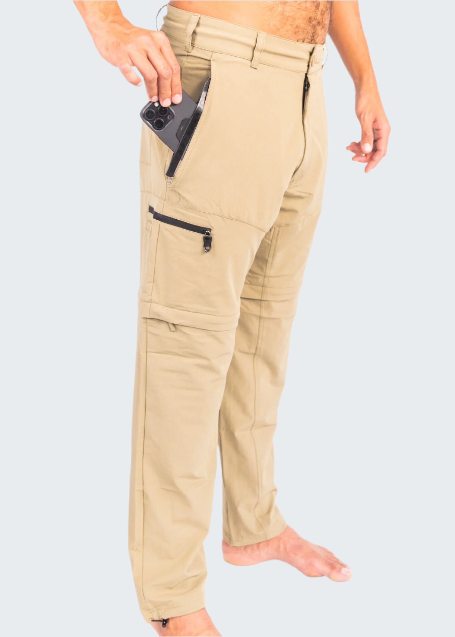 Beige pants with zippers on a white background