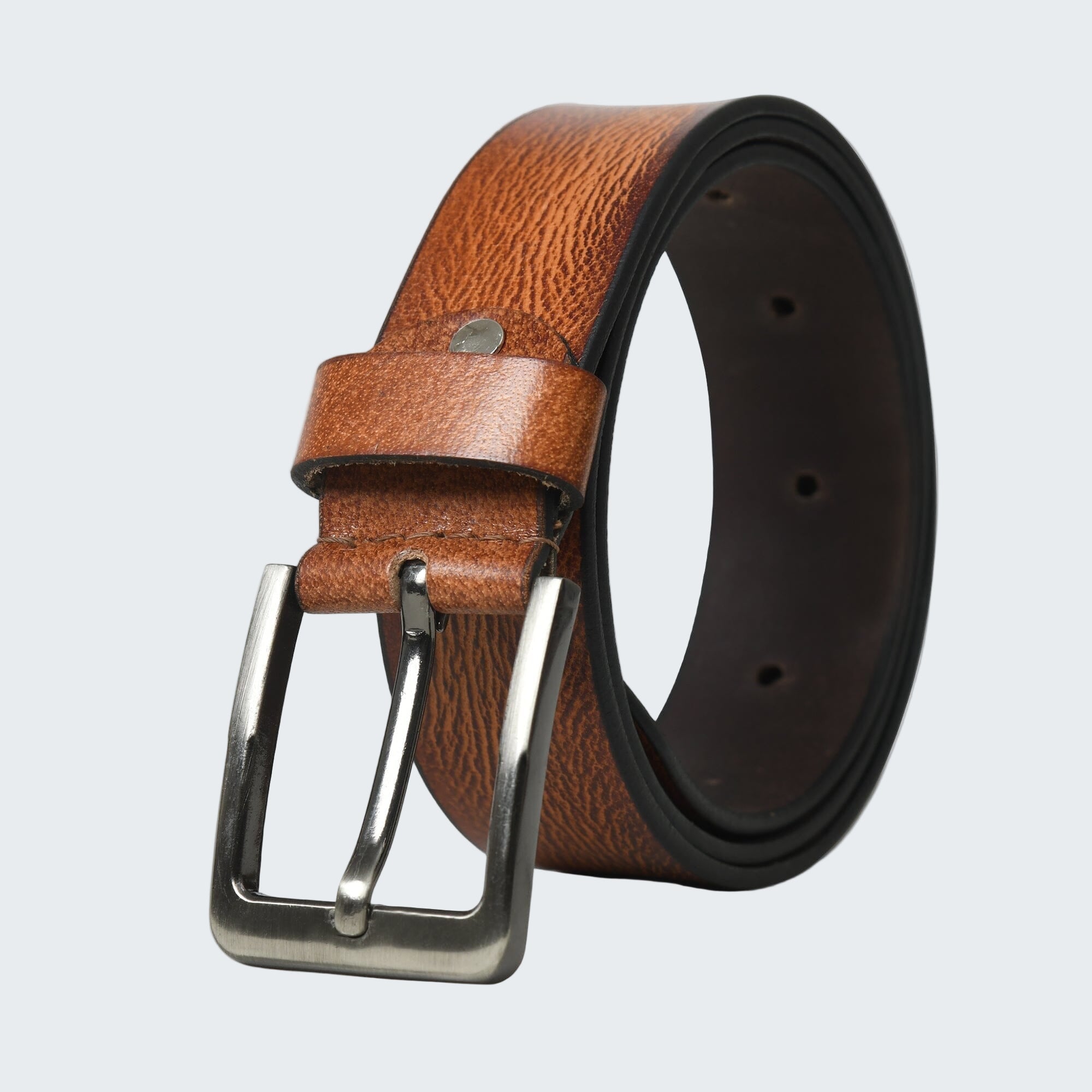 Brown leather belt with silver buckle on a white background