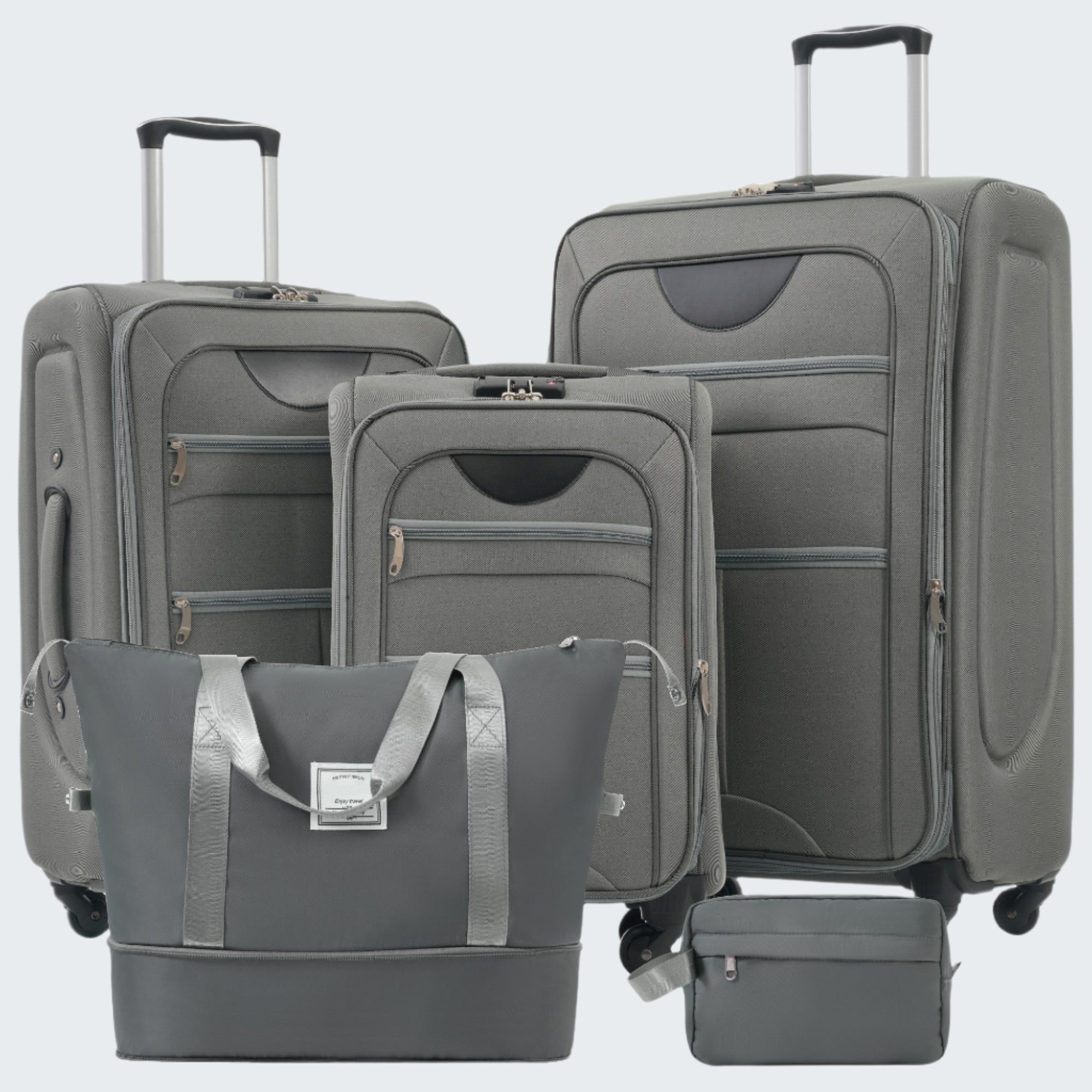 A set of gray softside luggage which includes a 20-inch, 24-inch, and 28-inch suitcase with spinner wheels, a duffel bag, and a toiletry bag.