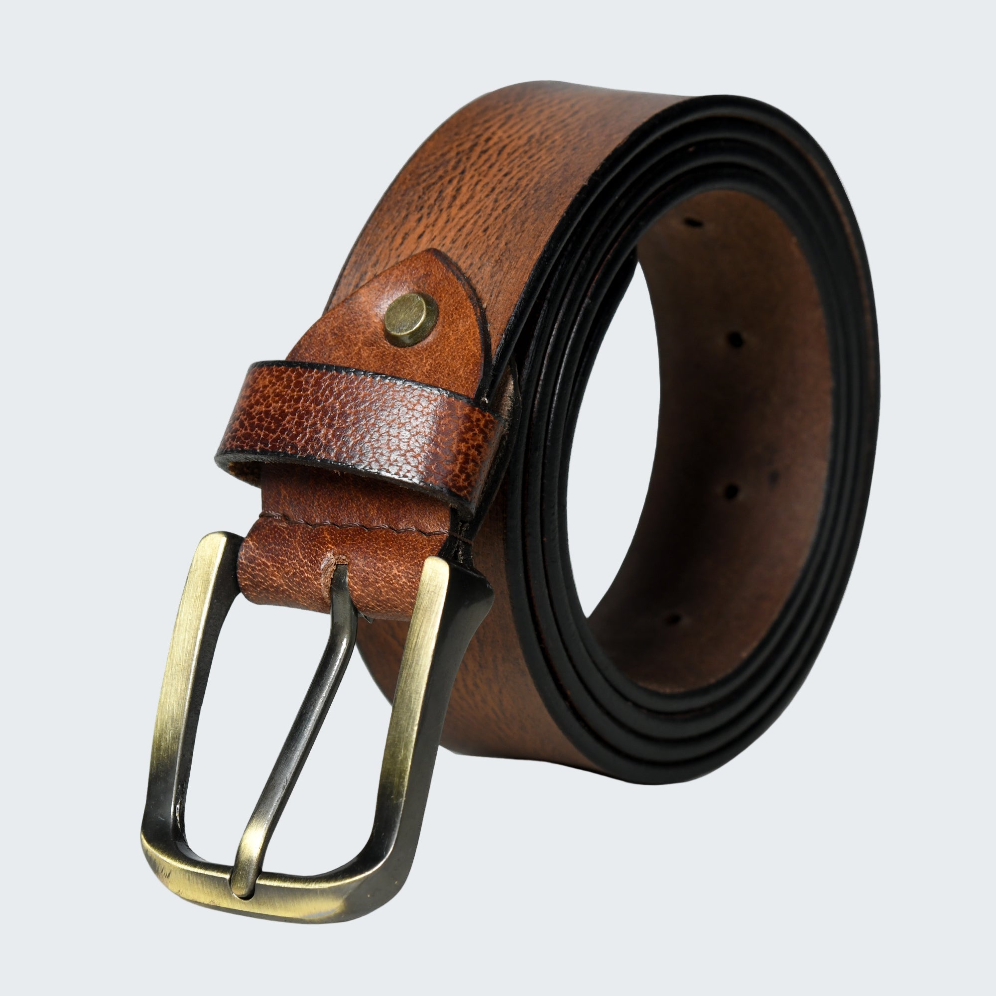 Brown leather belt with brass buckle on a white background