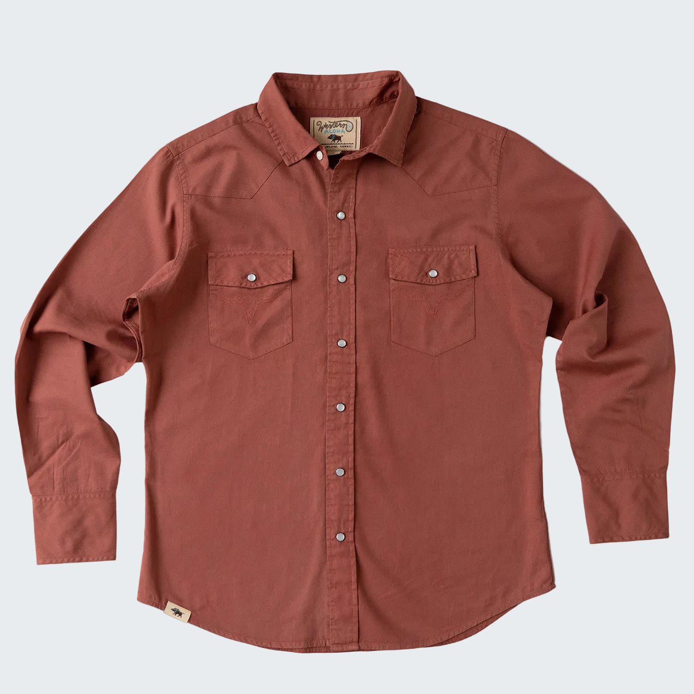 Brown button-up shirt with a brand label on a white background