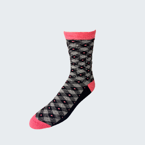 Patterned sock with pink accents on a white background