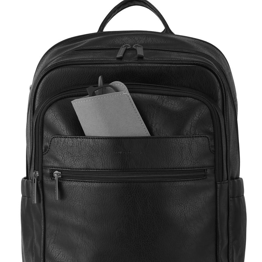 Black backpack with a compartment containing a gray notebook on a white background