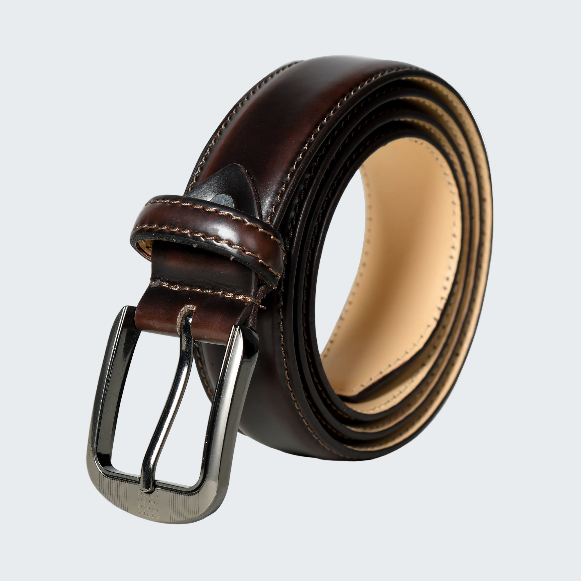 Brown leather belt with a silver buckle on a white background
