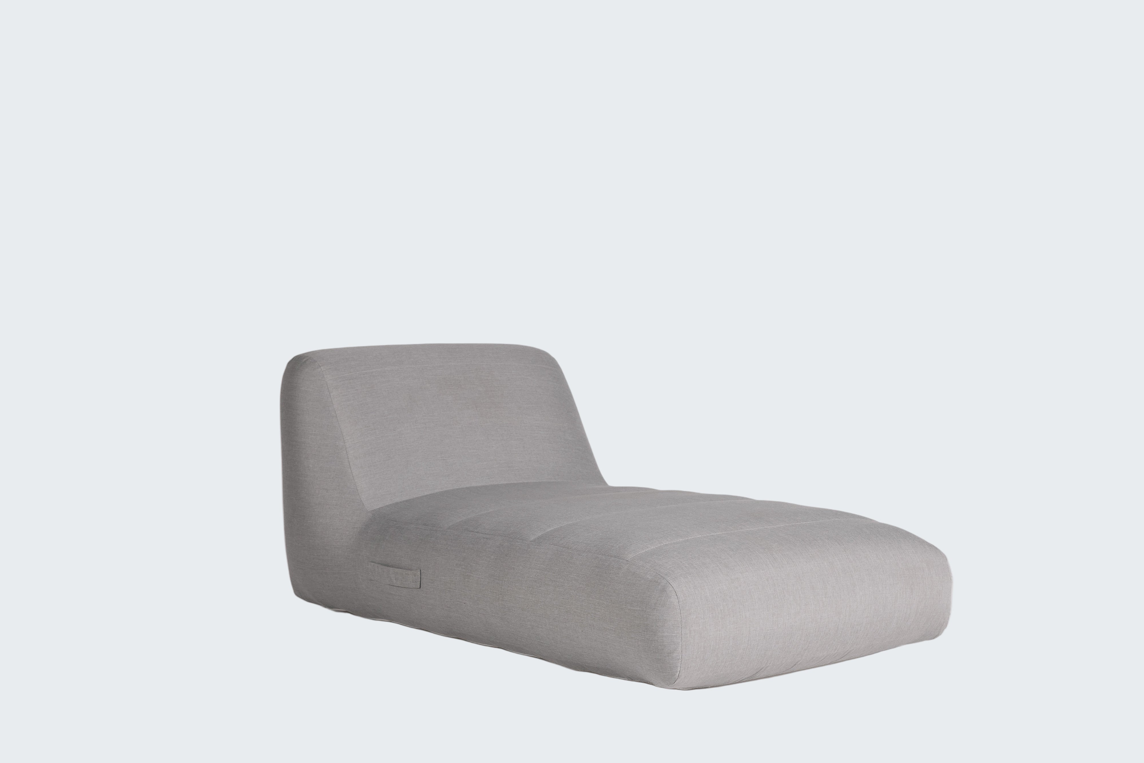 Gray lounge chair on a white background
