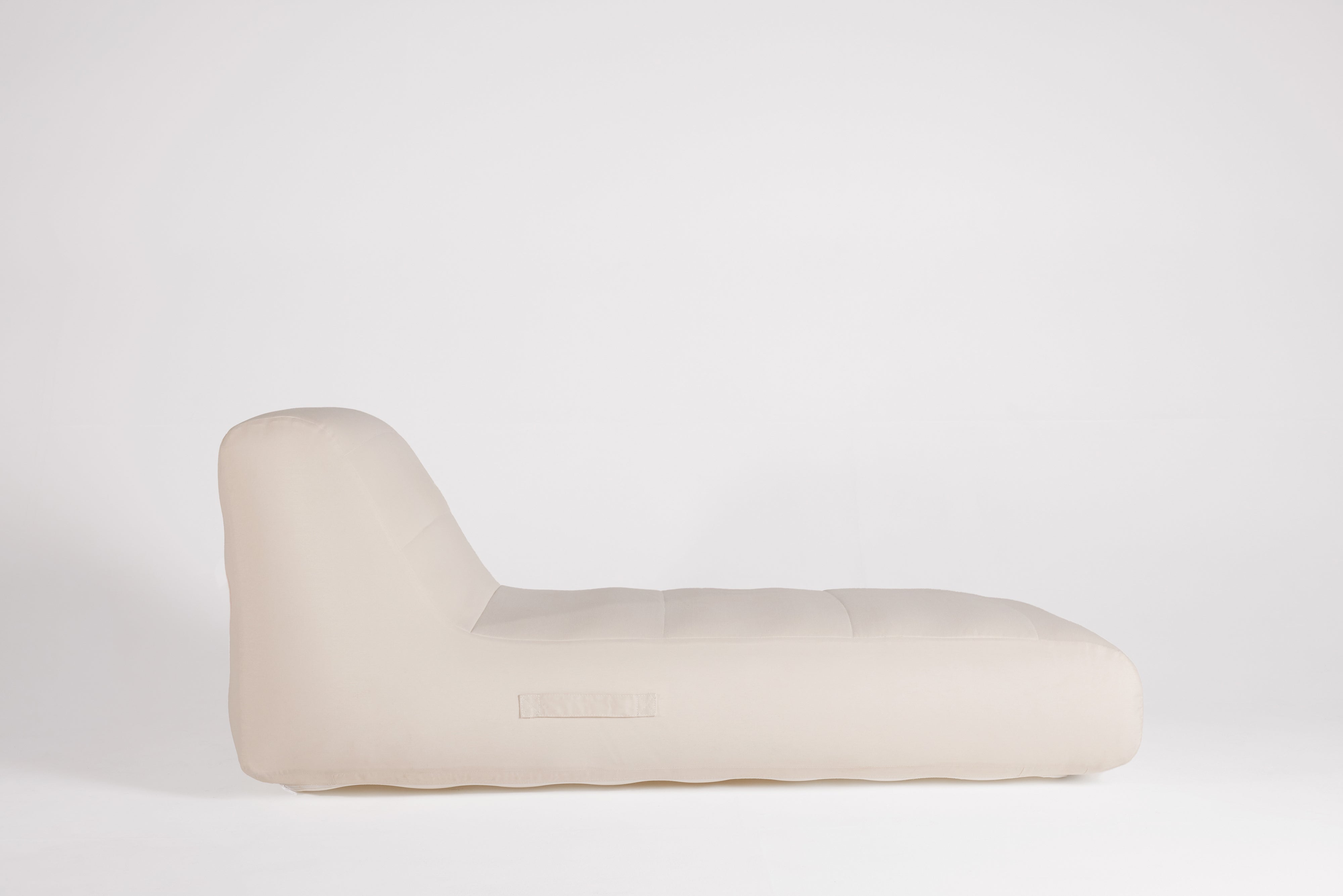 Beige cushion on a white background
