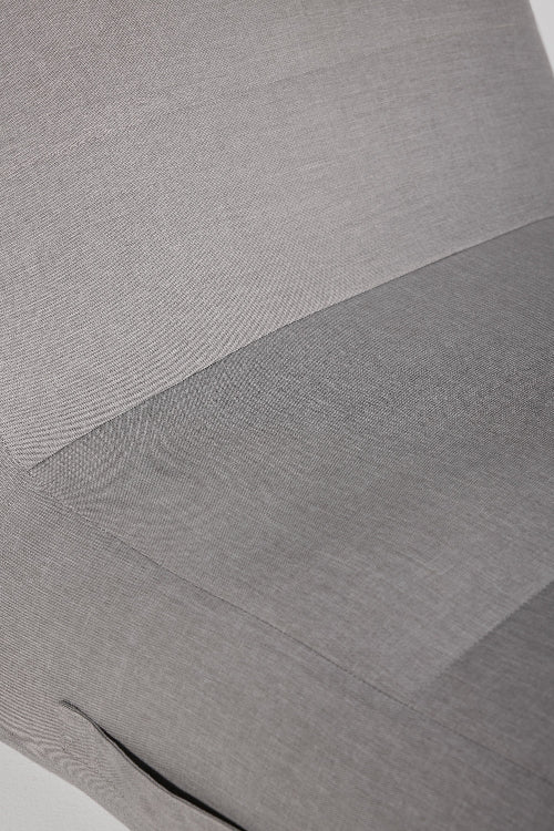 Close-up of gray fabric with a subtle pattern