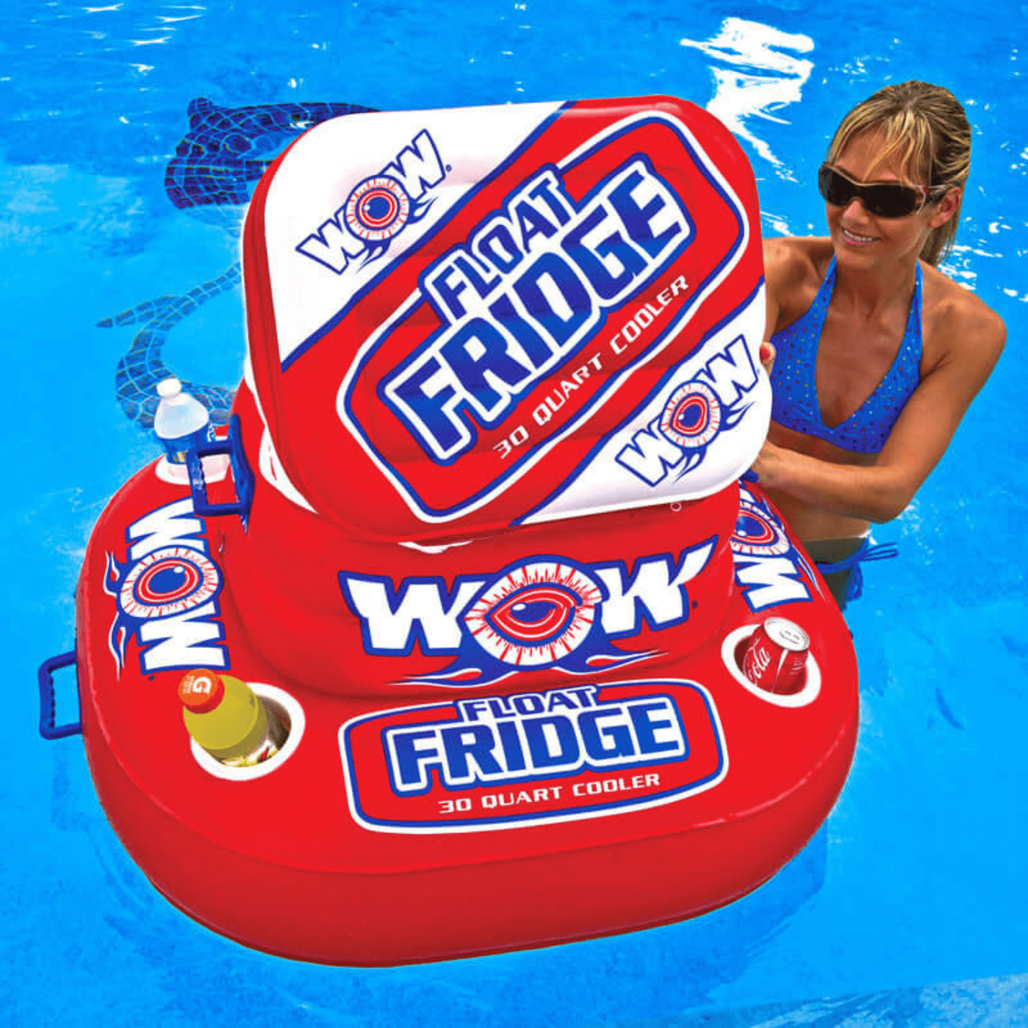 Red inflatable 'Float Fridge' cooler with 'WOW' branding in a pool, held by a person.