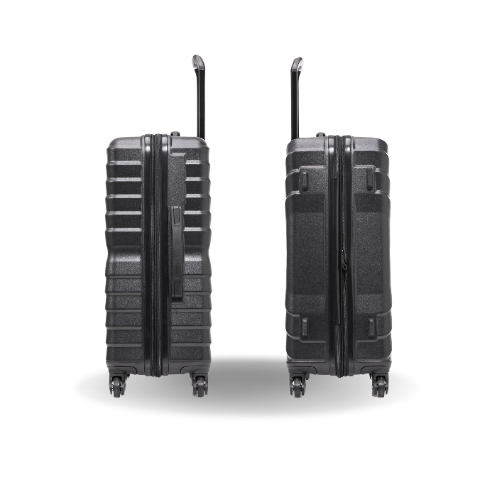 Two black suitcases on a white background