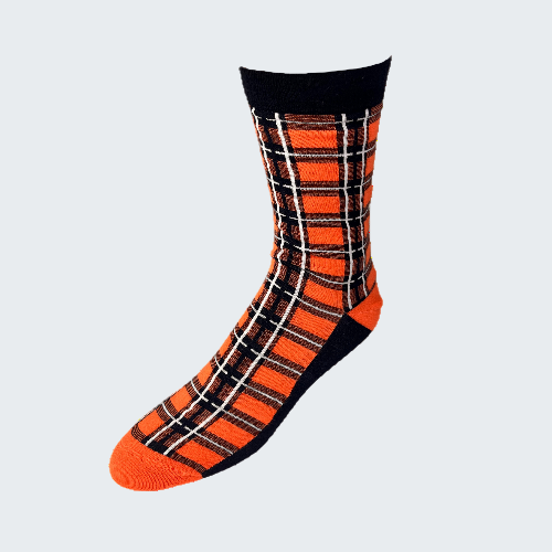 Plaid patterned sock with orange, black, and white colors on a white background