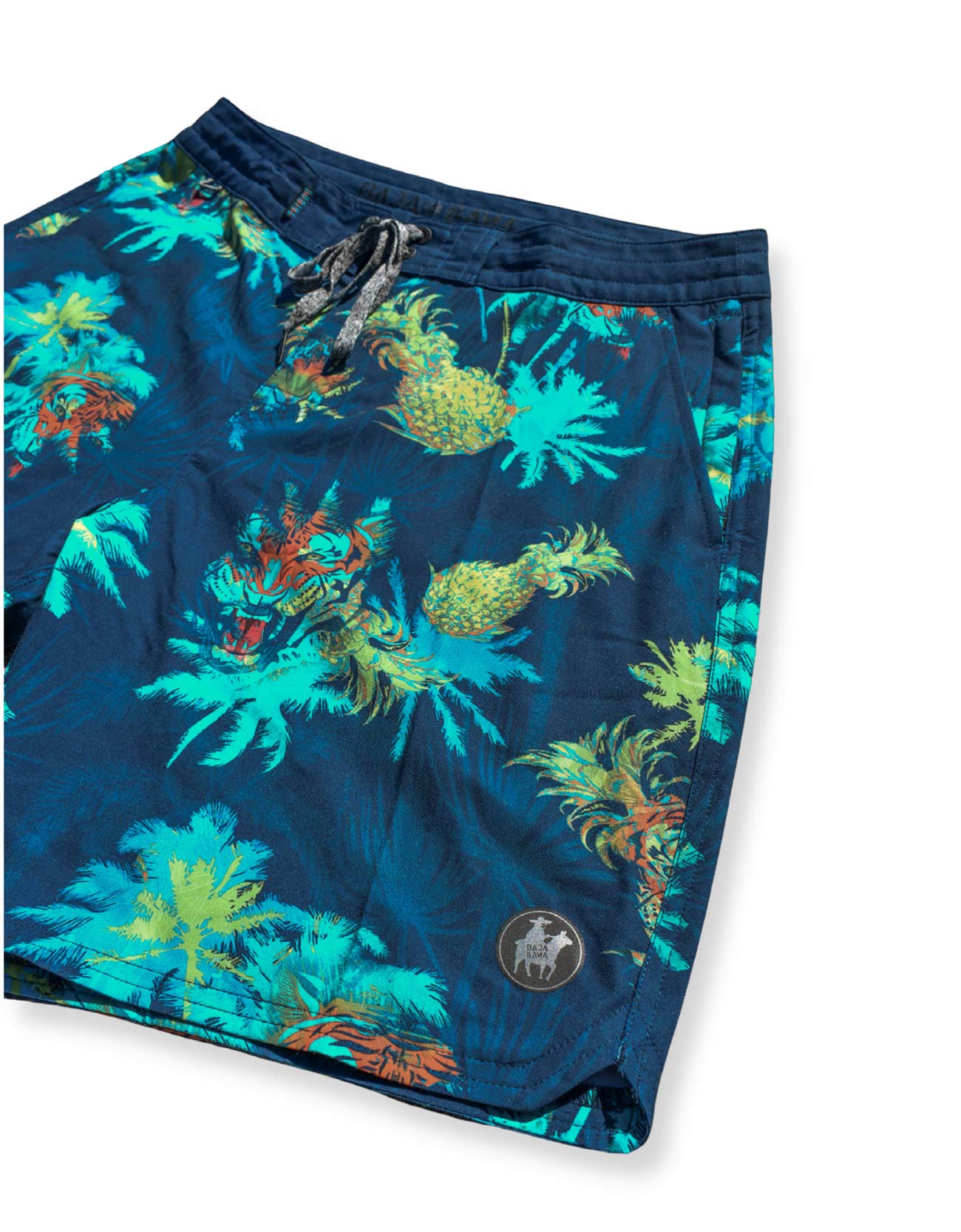 Blue swim shorts with tropical plant pattern on a white background