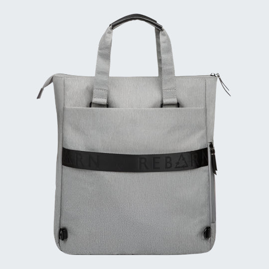 Gray tote bag with a black strap on a white background