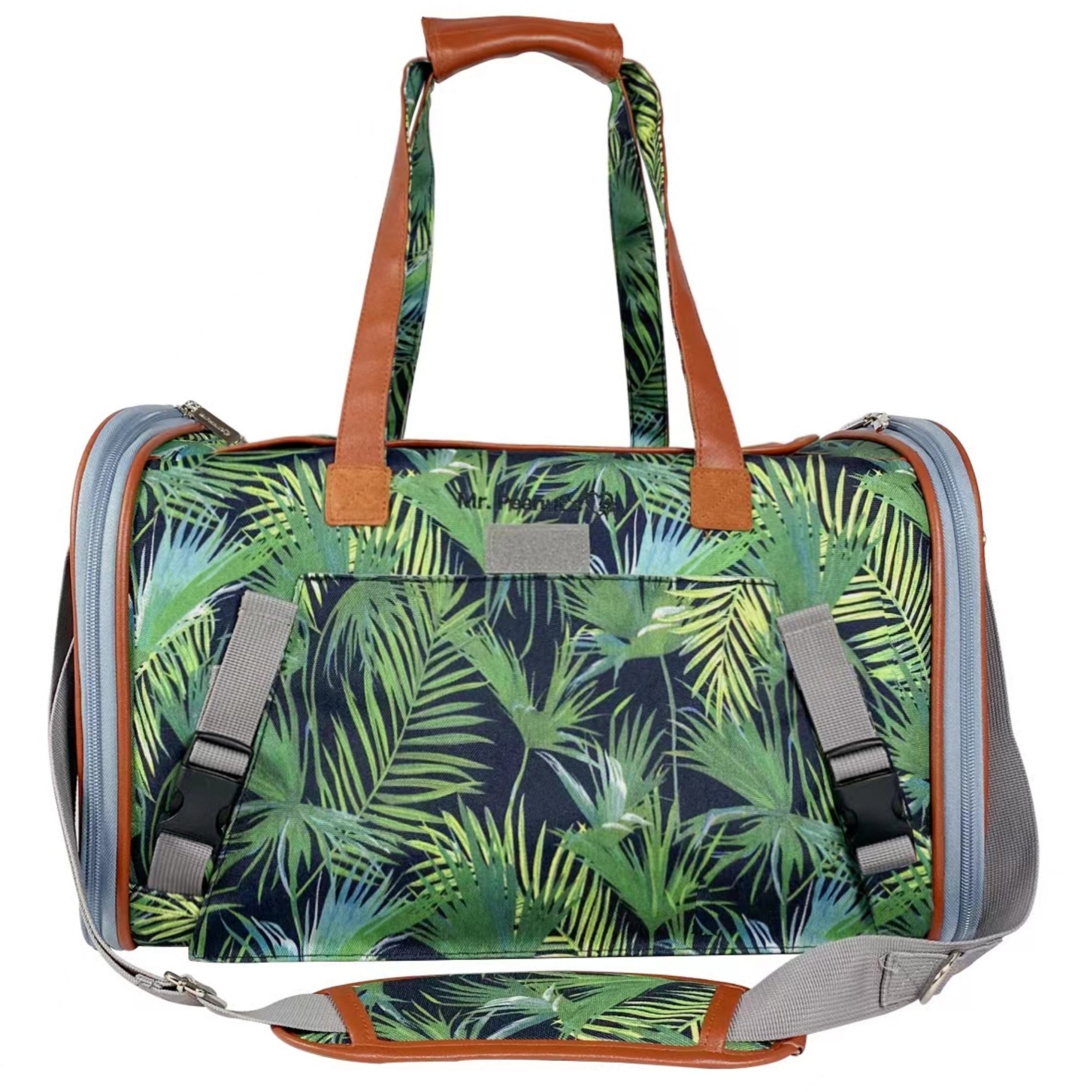 Duffle bag with tropical leaf pattern on a white background