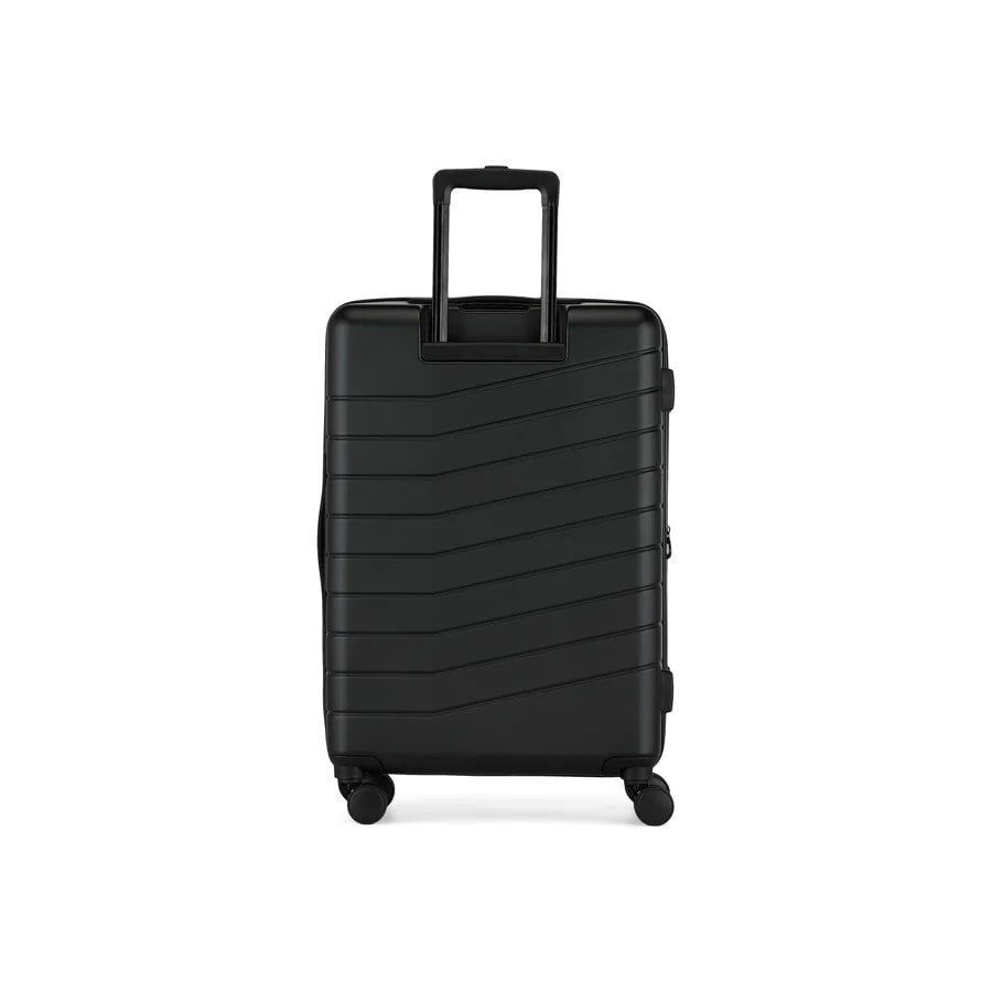 Black suitcase with a textured surface on a white background