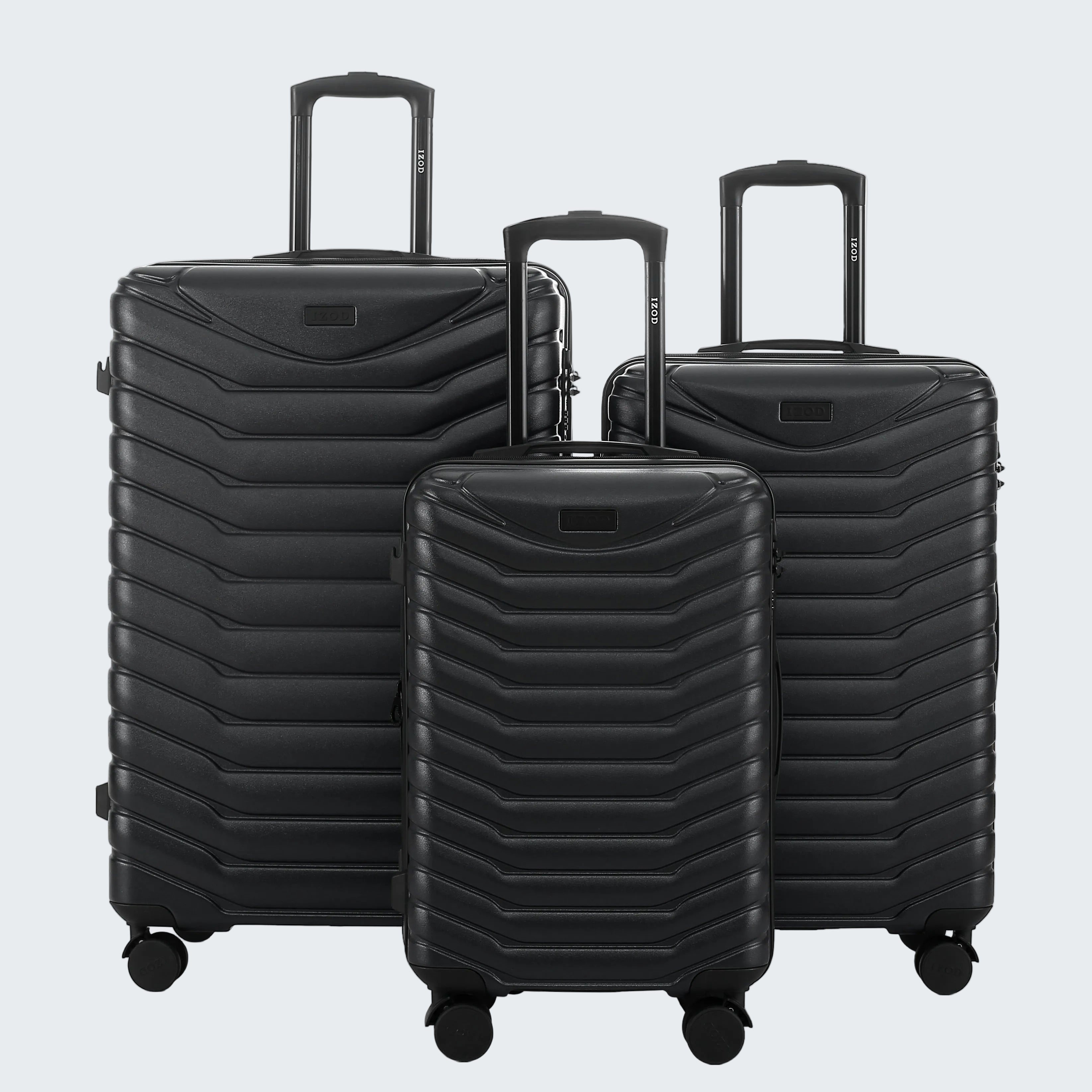 Set of three navy blue suitcases with a textured surface on a white background