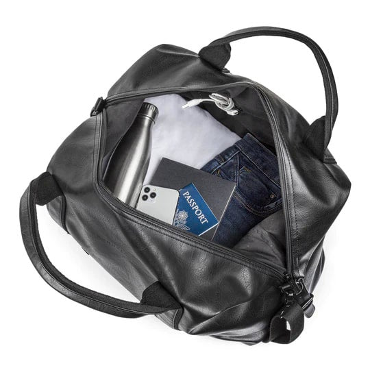 Black leather duffel bag with travel items including a water bottle, phone, and passport.