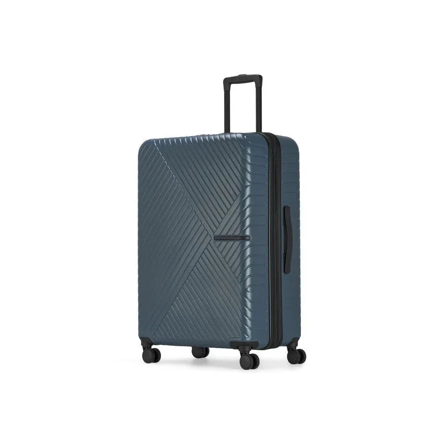 Blue suitcase with a geometric pattern on a white background
