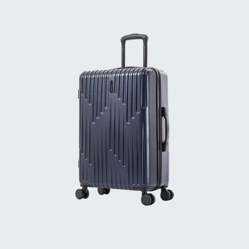 Navy blue suitcase with wheels on a white background