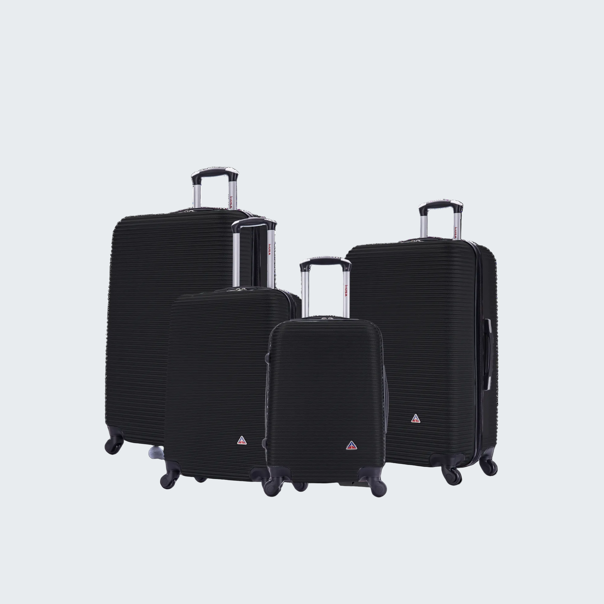 Set of black suitcases with wheels on a white background