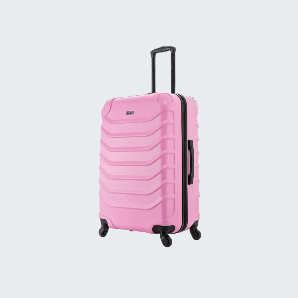 Pink suitcase with black wheels and handle on a white background