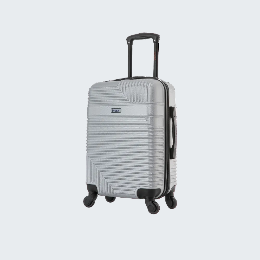 Silver suitcase with black wheels and handle on a white background