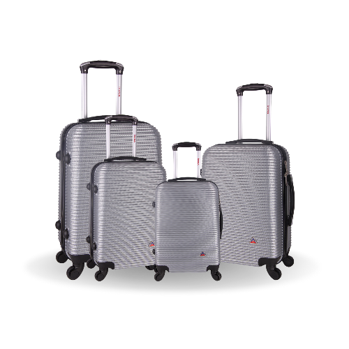 Set of silver suitcases with wheels on a white background