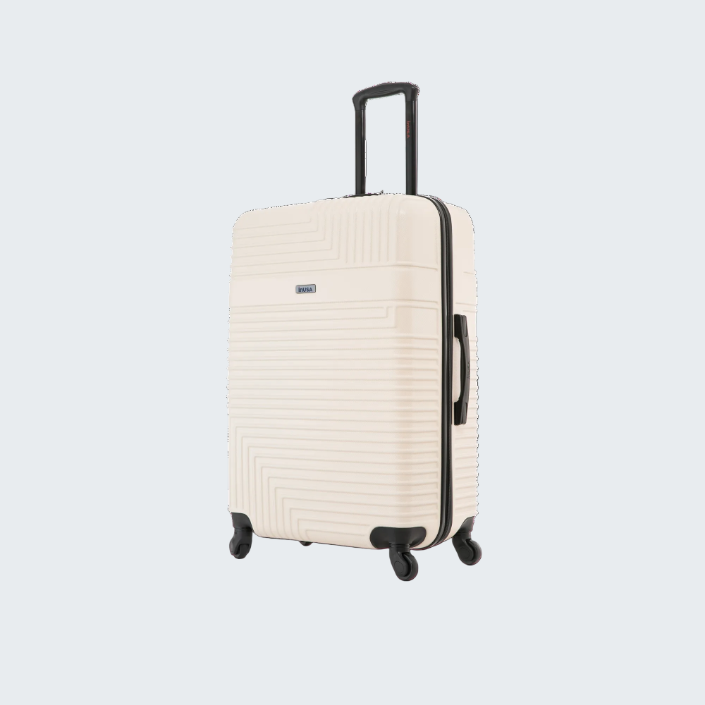 Beige suitcase with black wheels and handle on a white background