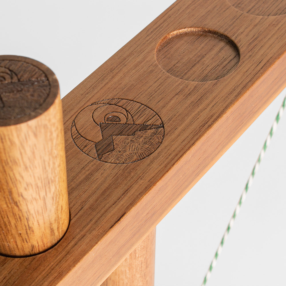 Wooden product with engraved design on a light gray background