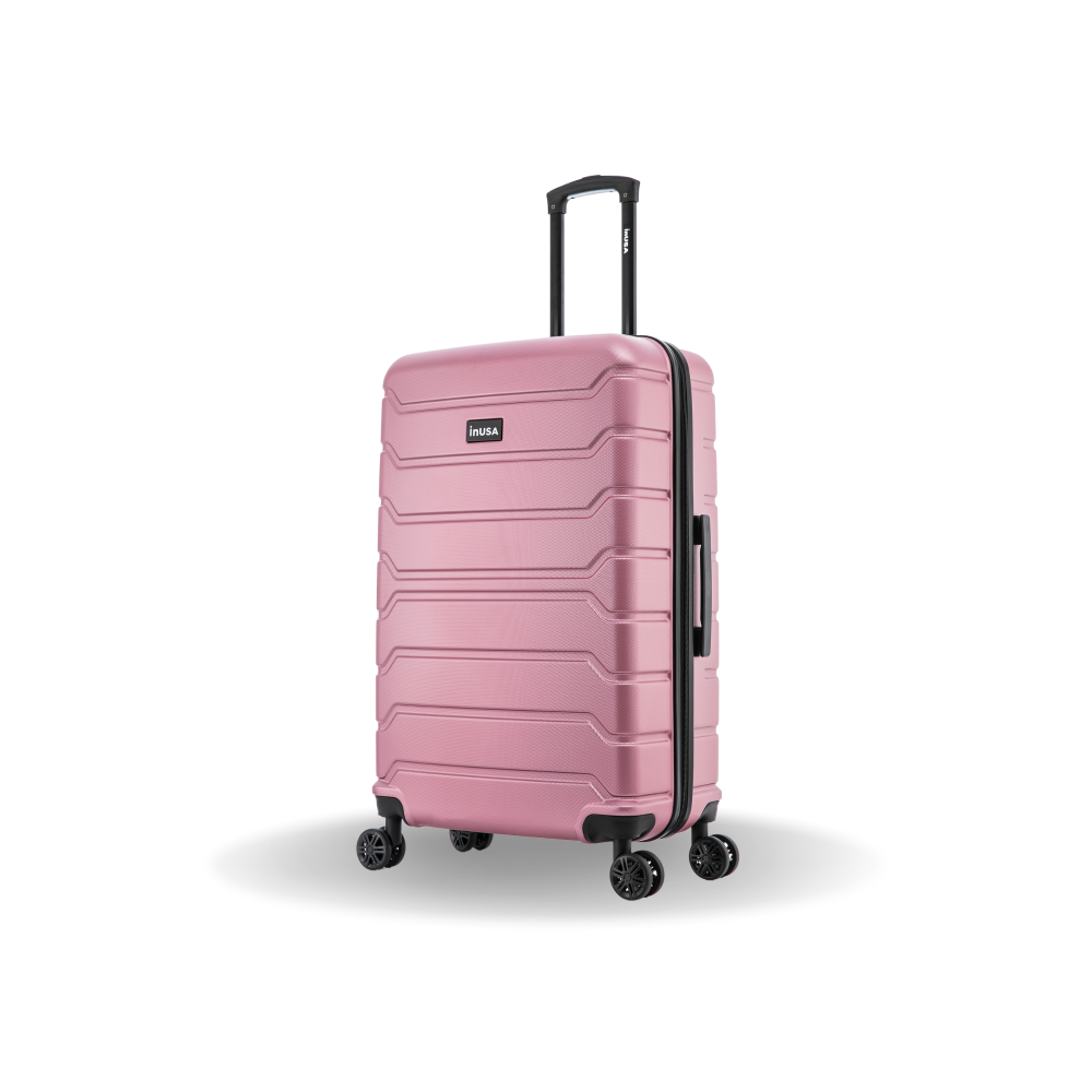 Pink suitcase with wheels on a white background
