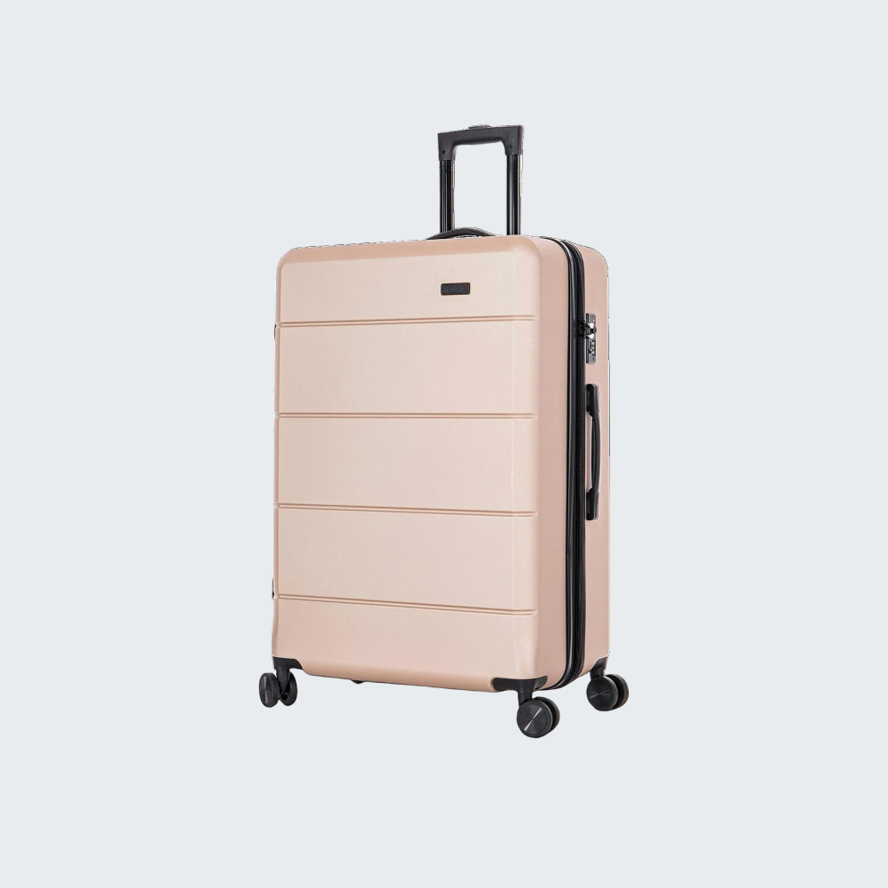Beige suitcase with black wheels and handle on a white background