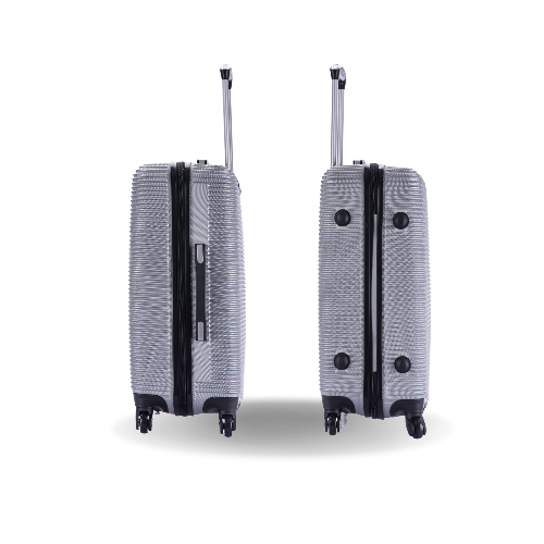 Two gray suitcases with black accents on a white background