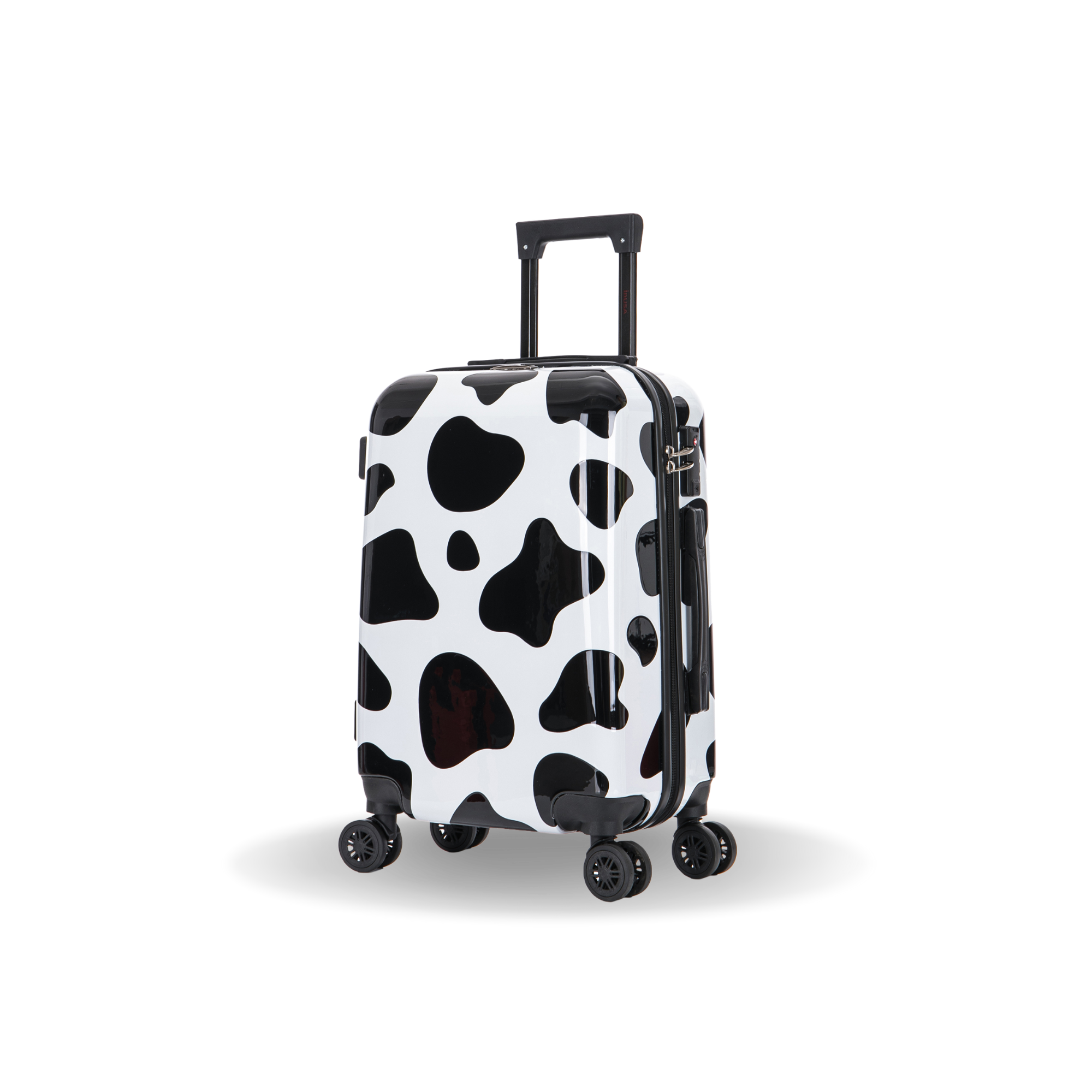 Black and white cow print suitcase on a white background
