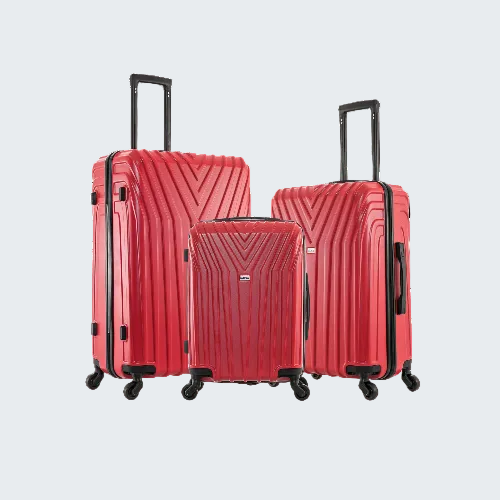 Set of three red suitcases with black wheels on a white background