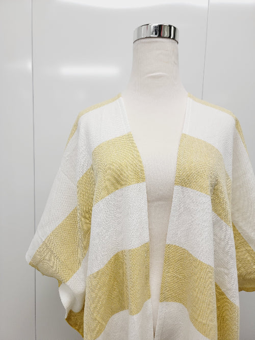 Mannequin wearing a yellow and white striped sweater against a white background