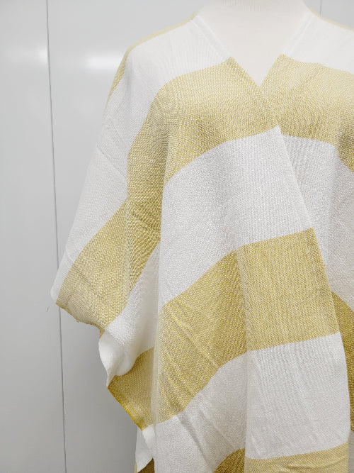 Yellow and white striped fabric on a white background