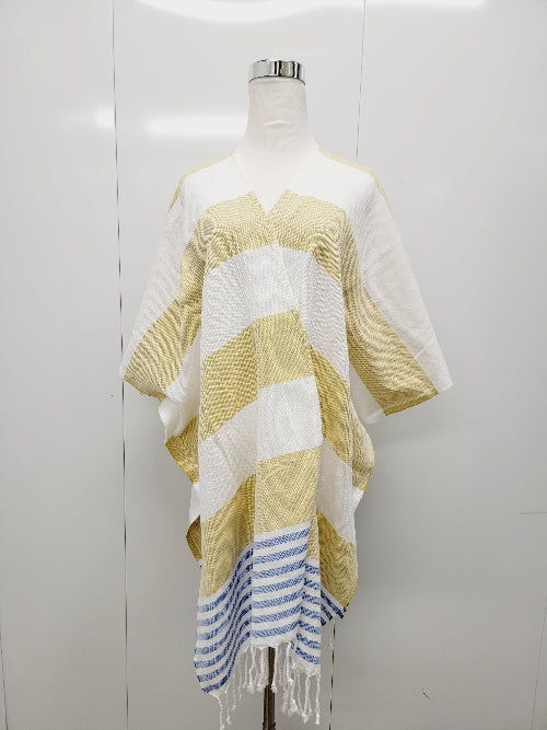 Mannequin wearing a yellow and white striped poncho with blue accents on a white background