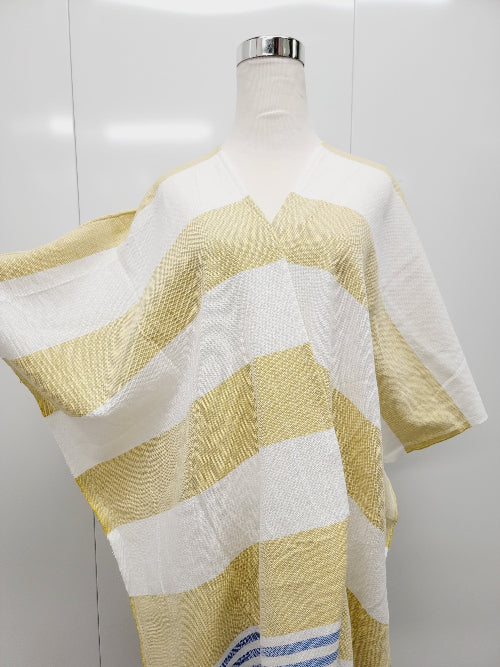 Mannequin wearing a yellow and white striped garment against a white background