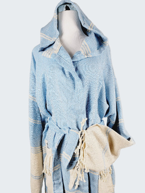 Light blue textured garment with white accents on a neutral background